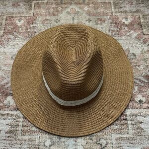 Woman’s Woven Tan Beach Lake Hat With White Trim